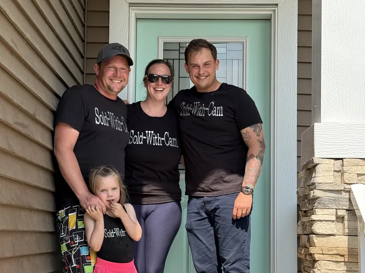 Alyss P. and family with Cameron at their front door