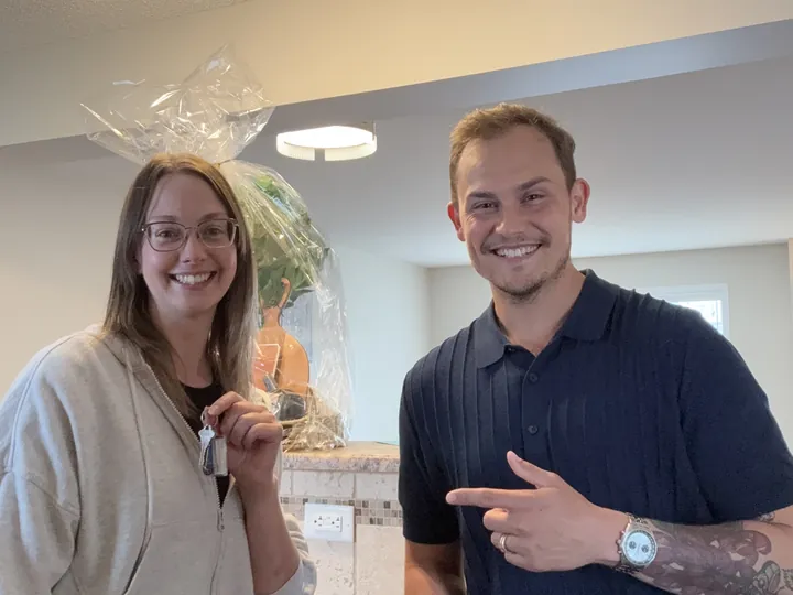 Jessica T. holding her keys, with Cameron